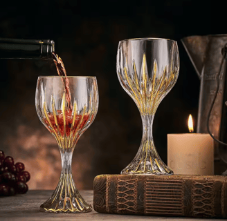 Crystal glasses cradle wine, gold - kissed charm lingers