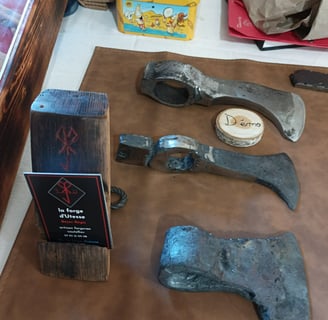 The three final stages of forging an axe head