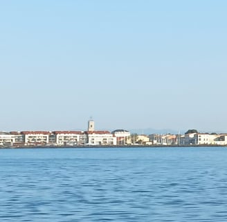 The town of Marseillan at the far end of the étang