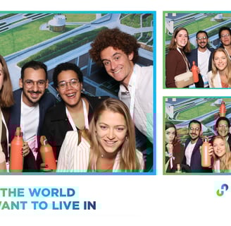 a group of people posing for a photo booth