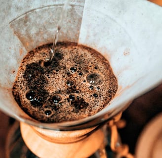 Specialty Colombian coffee being prepared using pour over technique
