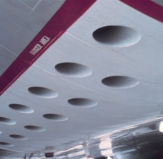 External P-3 NOAA chutes for deploying Airborne Expendable Bathythermographs (AXBT). Photo: NOAA.