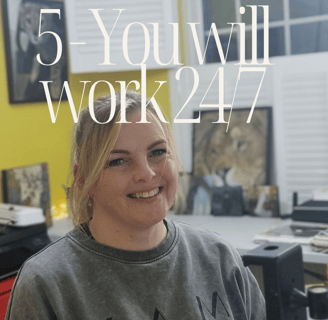 a woman in a gray sweatshirt and a yellow shirt with a cat on it