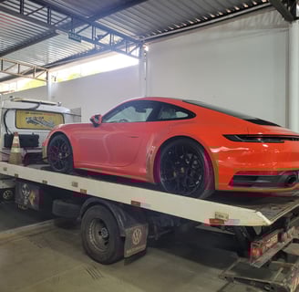 guincho auto socorro porsche laranja