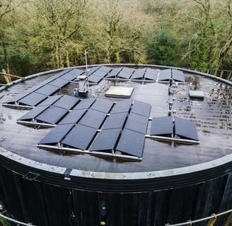 Few rows of solar panels on a circular building