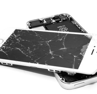a broken phone with a broken screen and a broken phone