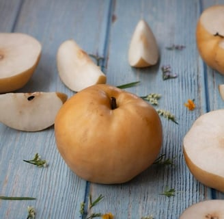 a bunch of korean pears on a table