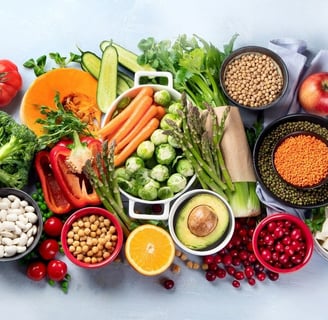 a variety of fruits and vegetables in bowls