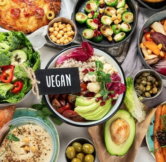 a table with a variety of different types of plant based food