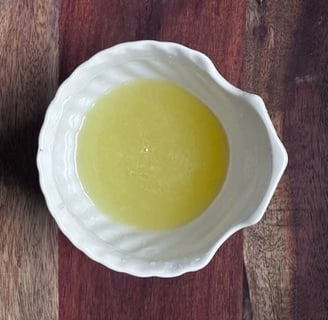 About 1/2 cup of lemon juice 
