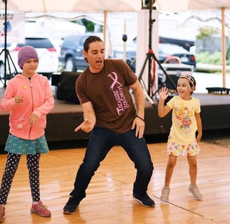 Mekhael Srour and his students dancing