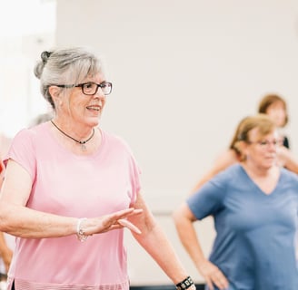 elderly female adults in exercise class