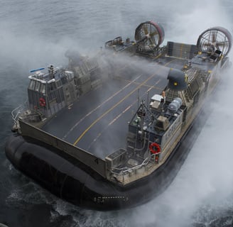 a boat with a large amount of smoke coming out of the water