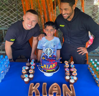 Ben and Grant helping Kian celebrate his birthday at NEAT HQ