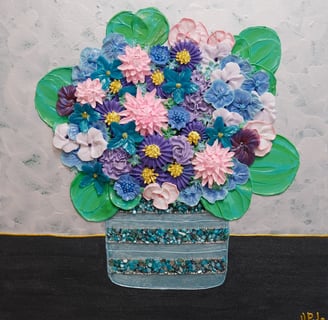 a vase with flowers in a vase on a table