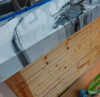 a counter top with a epoxy marble counter top
