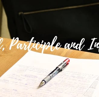 a pen and a pen on a desk with a pen and paper