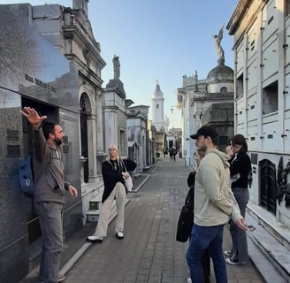 Esteban guiding a small group through Recoleta Cemetery on an English-speaking tour