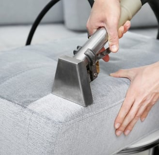 lifting a dirt from sofa