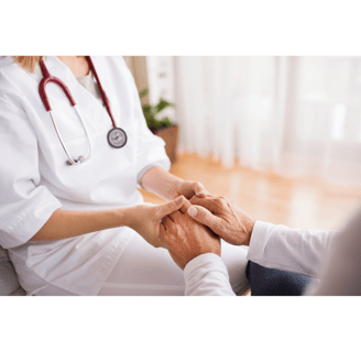 a doctor holding hands with a patient