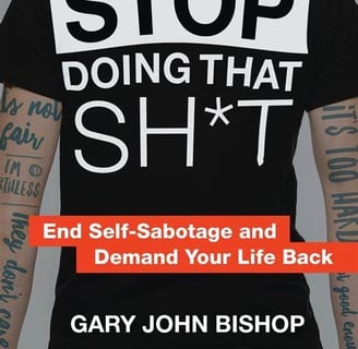 a man with tattoos on his back and a t - shirt that says stop doing