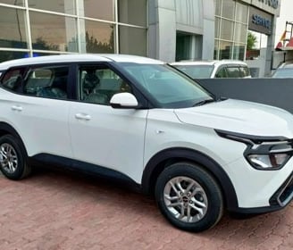 Kia Carens taxi service in Amritsar to local and outstation for family