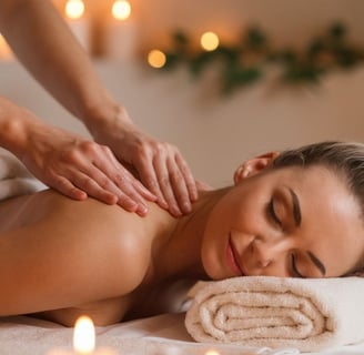 a woman getting a massage at a spa