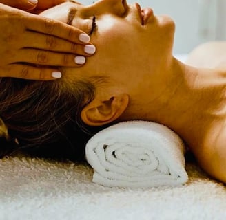 a woman getting a massage at a spa