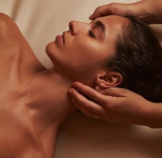 a woman getting a massage at a spa