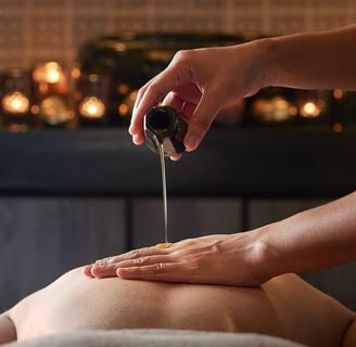 a woman getting a massage at a spa