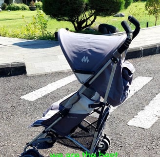 a stroller with a baby in a stroller