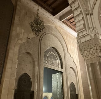 mosque entrance with artwork and pillars