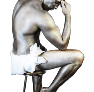 male-seated-on-barstool