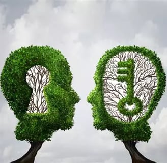 Deux têtes humaines en forme d'arbres qui se regardent, l'une avec 1 clé l'autre avec 1 serrure