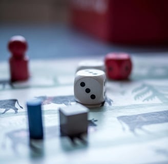 Board game with game pieces and dice