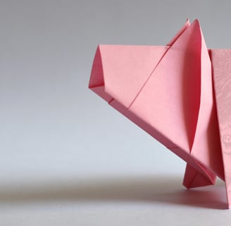 image of origami pink pig with abstract scribbles of the three pigs story