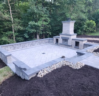 Outdoor fireplace in Williamsburg VA created by The King's Garden