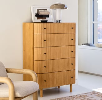 tall dresser fluted design light wood