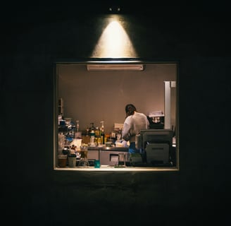 woman working in the kitchen late at night