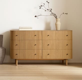 wooden dresser fluted with black handles