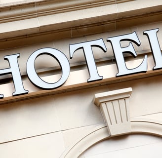 a hotel sign on the side of a building