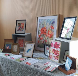 a table with a table cloth covered with pictures and pictures