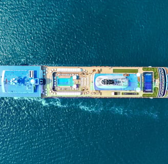 a large boat is traveling down the water