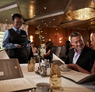 a waiter and waitress in a restaurant