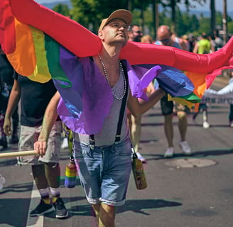 Geneva gay pride, man with wings, rainbow pride wing
