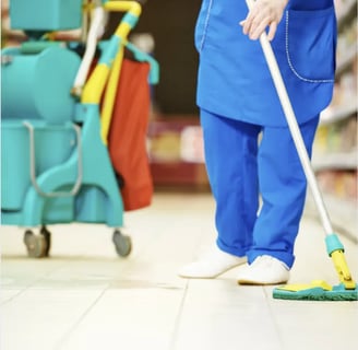 Woman Cleaning a Floor