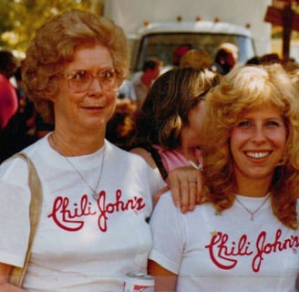 Edna LaMere and daughter Christine enjoy a chili cook.off