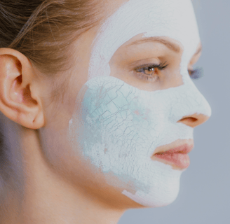 Woman using a blackhead mud mask