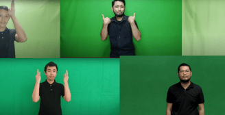 a man in a black shirt and a green screen