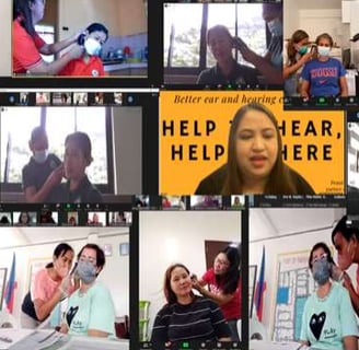 a group of people are gathered around a video conference